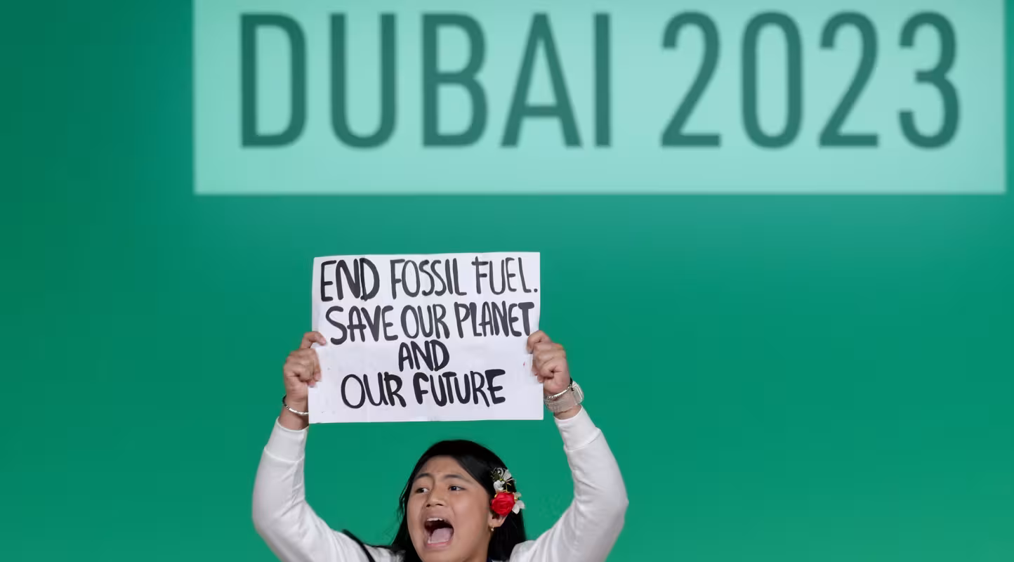 Protester onstage at the Global Climate Action High-Level Event